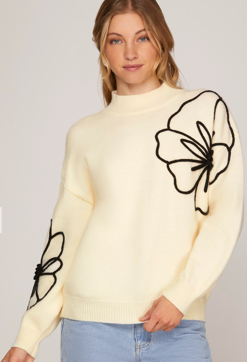 SWEATER TOP WITH FLOWER EMBELLISHMENTS