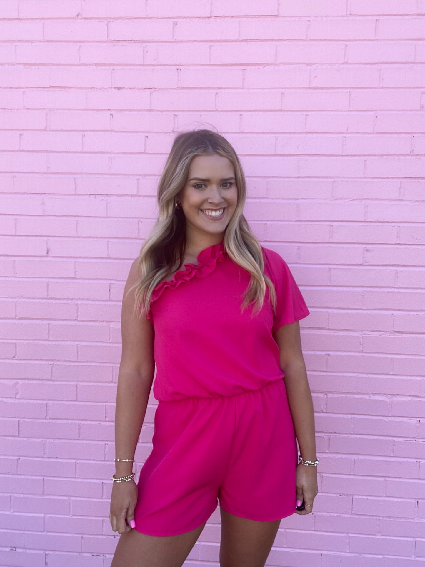 One Shoulder Pink Ruffle Romper