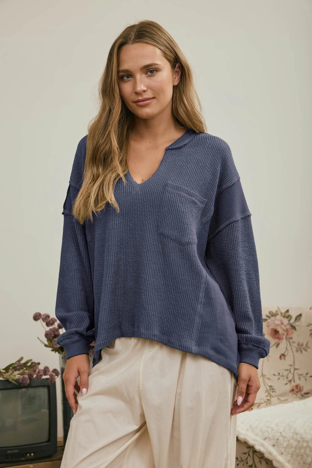 SPLIT NECK RIBBED KNIT TOP