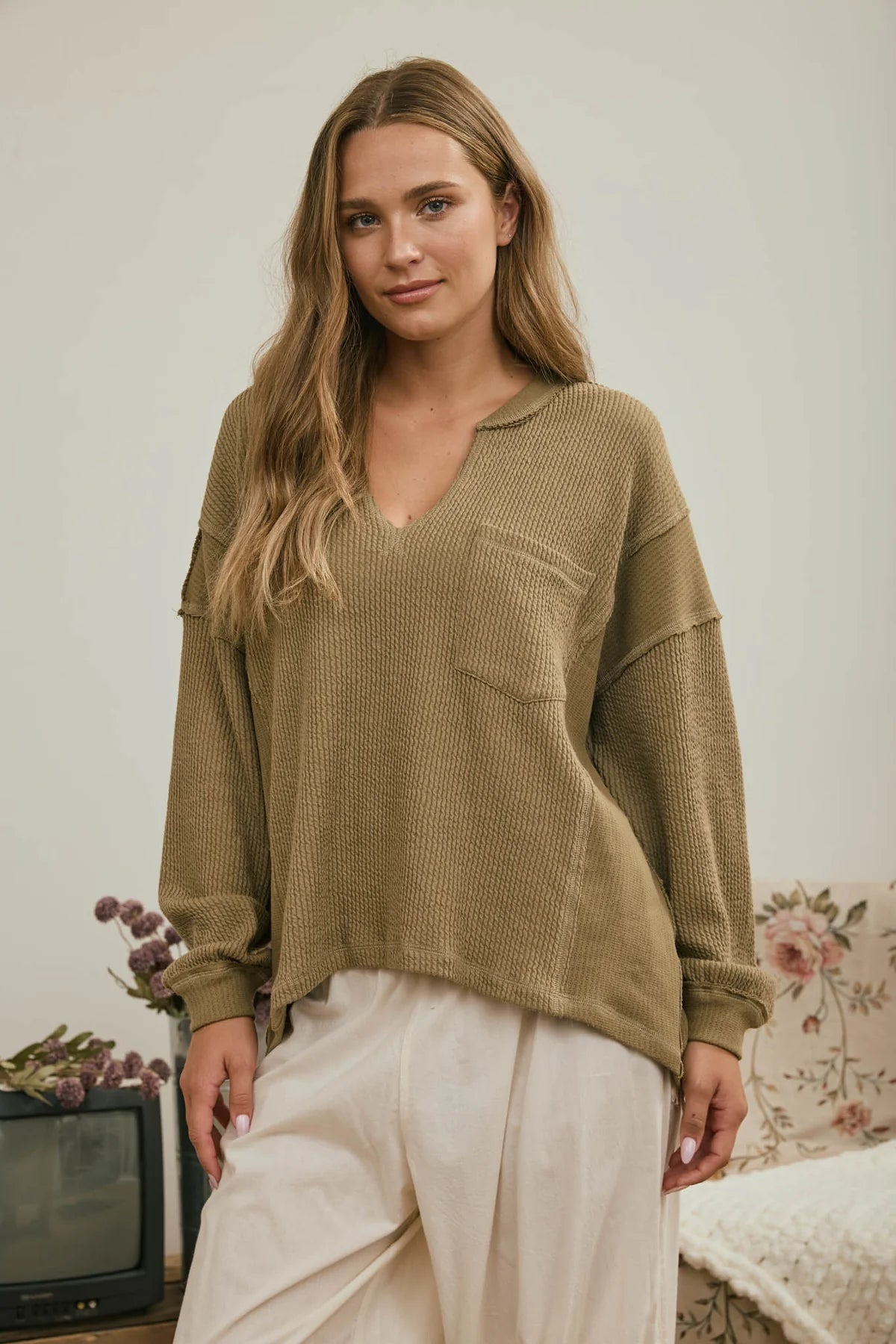 SPLIT NECK RIBBED KNIT TOP